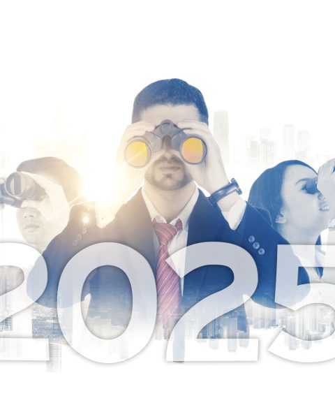 business-people-look-through-binoculars-with-2025-new-year-numbers (1)